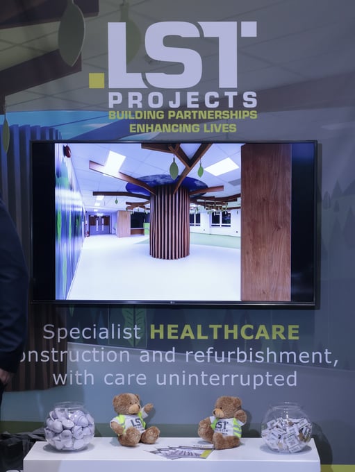 LST Projects exhibition stand showcasing specialist healthcare construction and refurbishment.